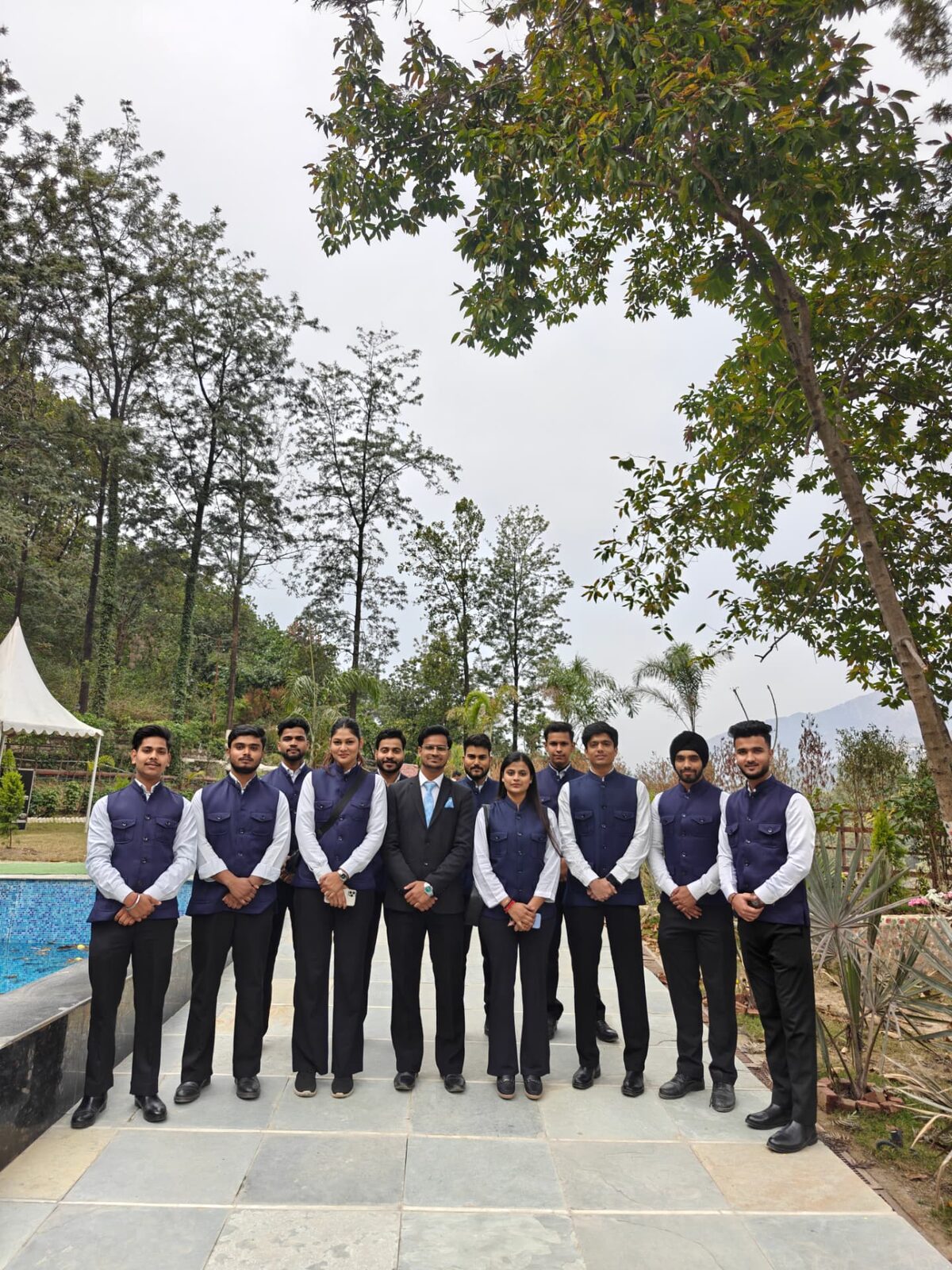 Harmony crew in navy uniforms at a resort corporate offsite