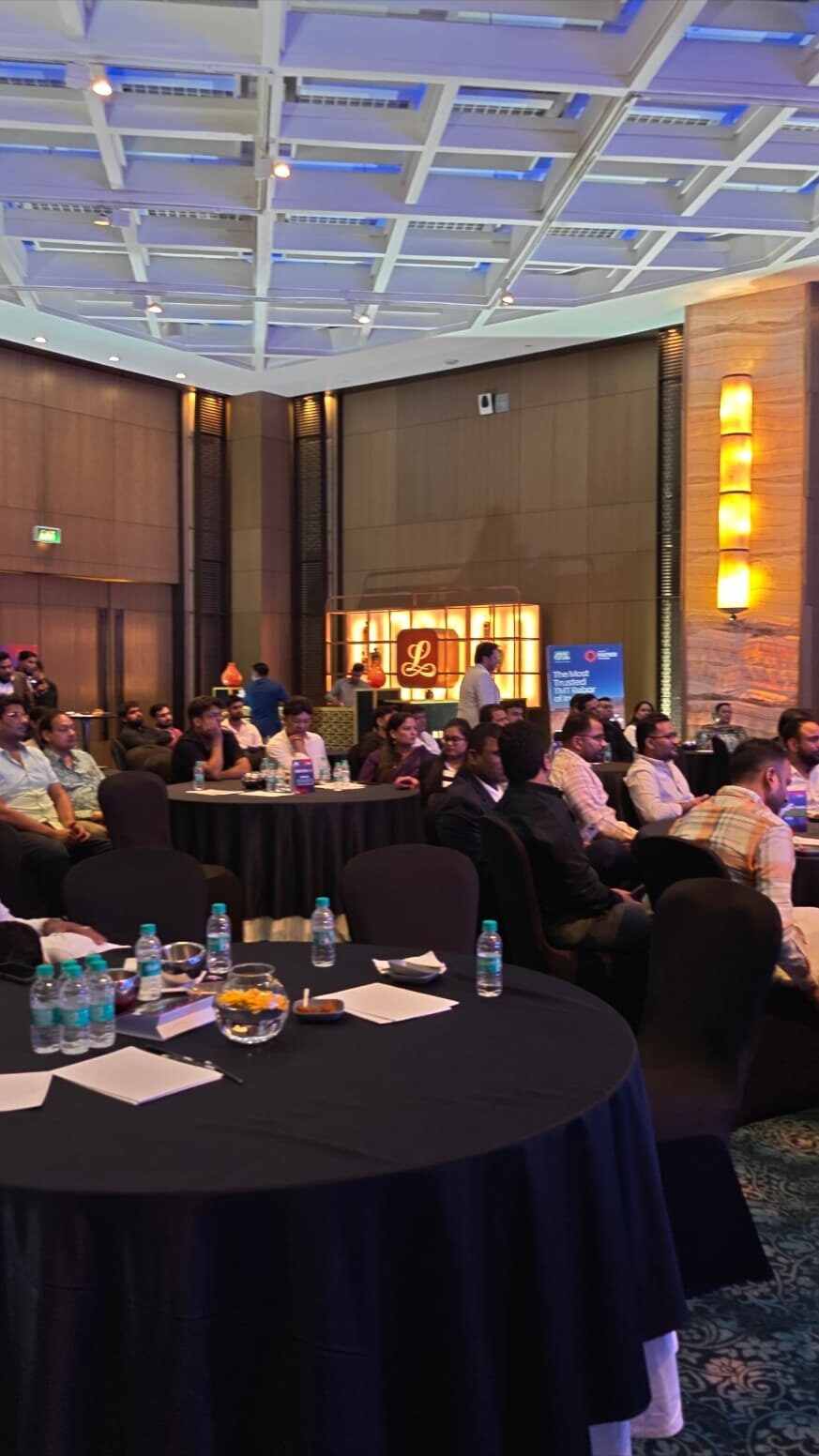 Corporate conference hall session managed by Harmony